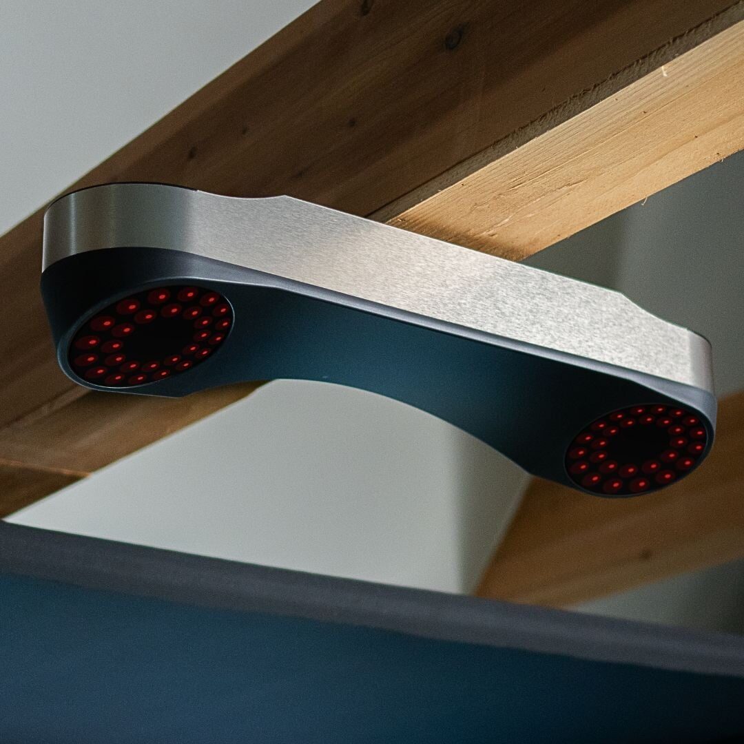 ProTee VX launch monitor mounted overhead under a ceiling beam