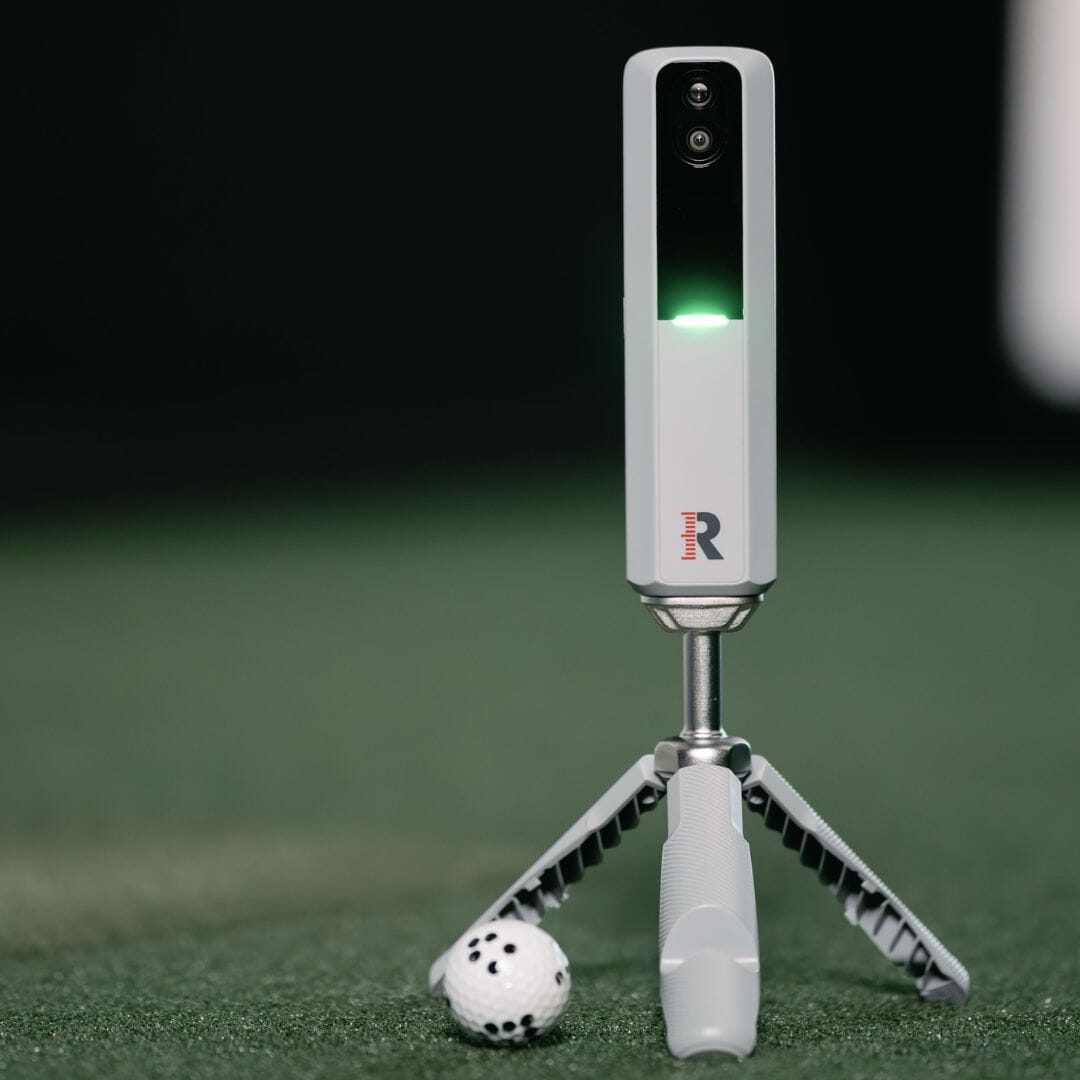 Rapsodo MLM2PRO on its tripod with a dotted RPT ball