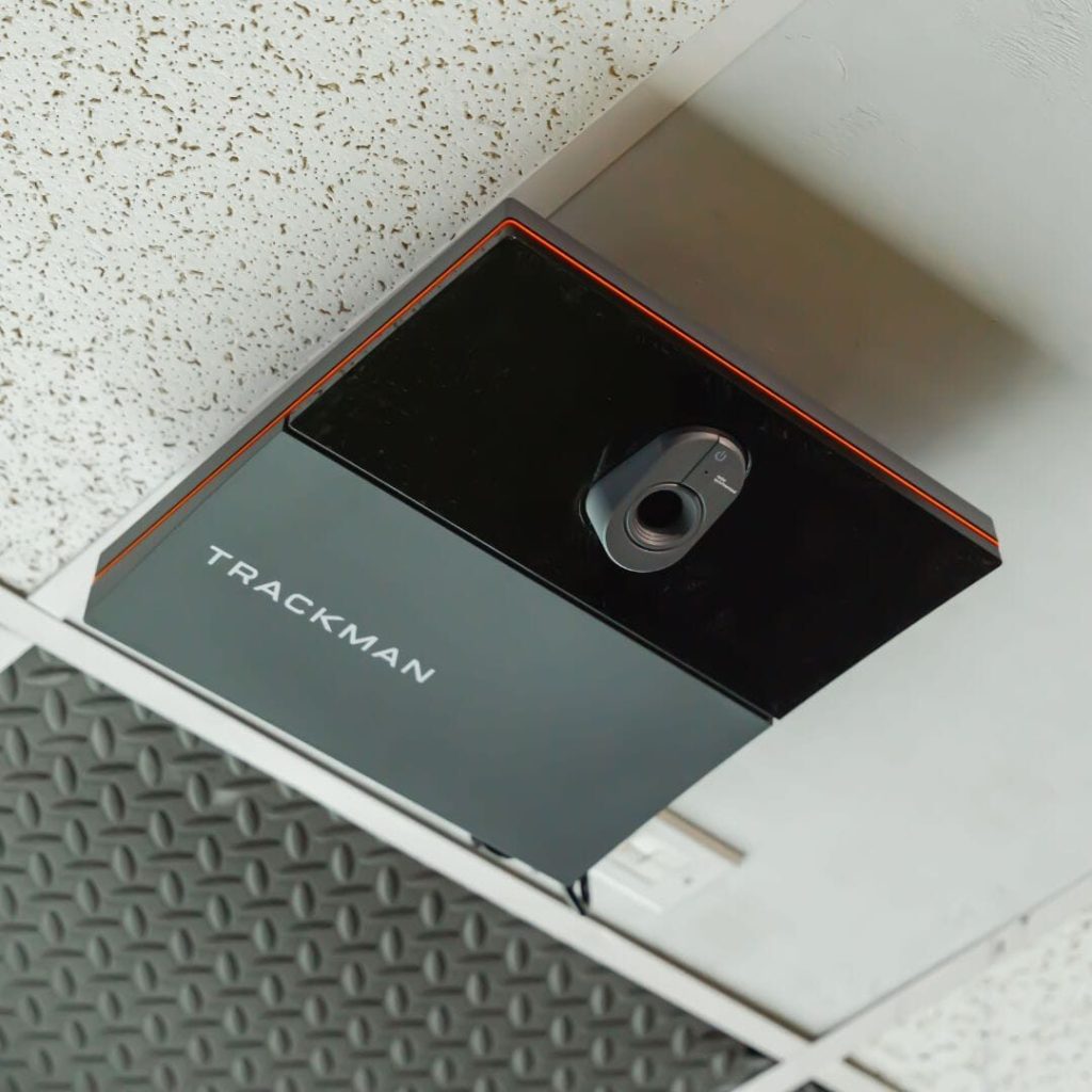 Trackman iO launch monitor mounted in a ceiling