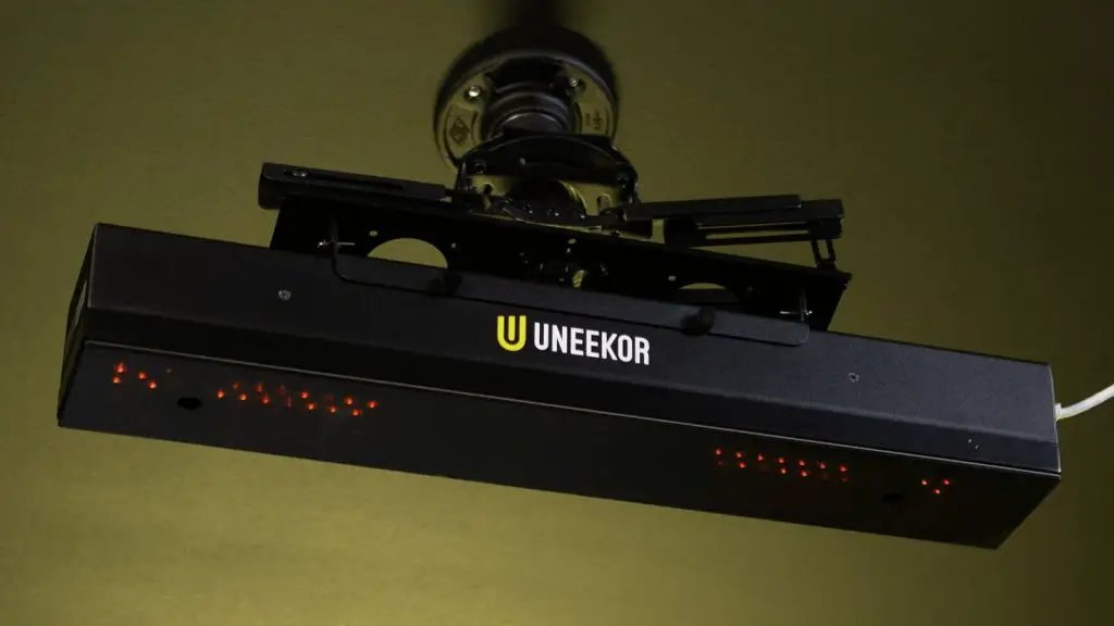 Golf Simulator Budget Builds: Five Builds Priced Part by Part, From $1,600 to $24,000 (2026) 5 Uneekor EYE XR launch monitor mounted overhead